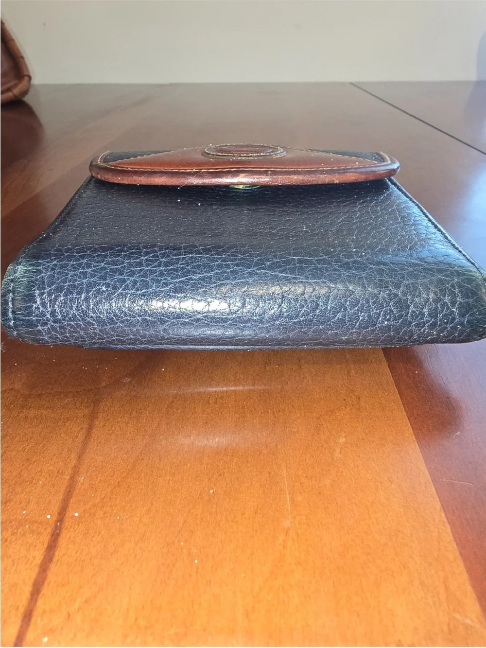 Dooney & Bourke Black and Brown Leather Bi-Fold Wallet vintage.